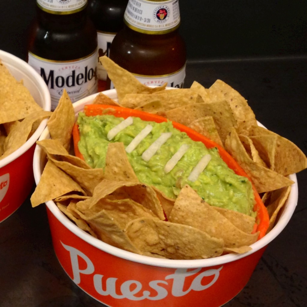 taco bar superbowl party - chips and guacamole football bowl
