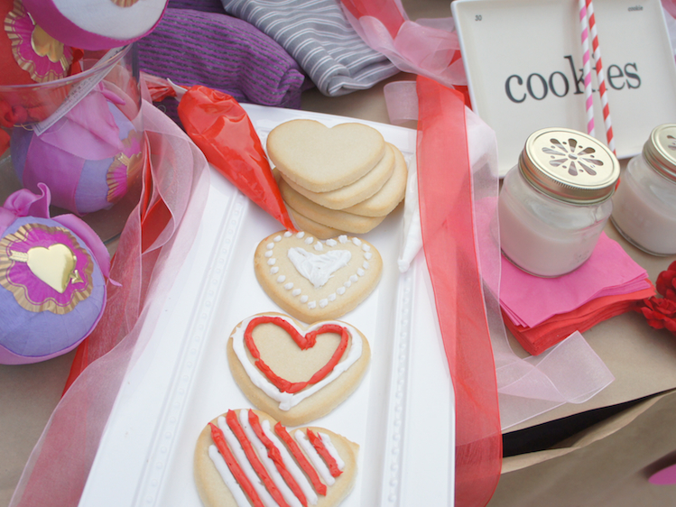 Decorate heart cutout cookie for vday