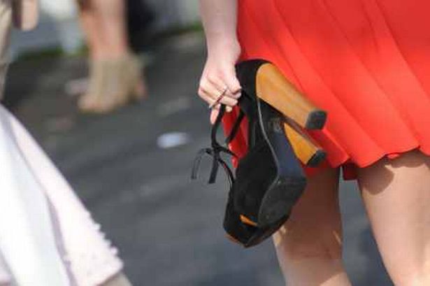 walking with heels in hand - stiletto ouch