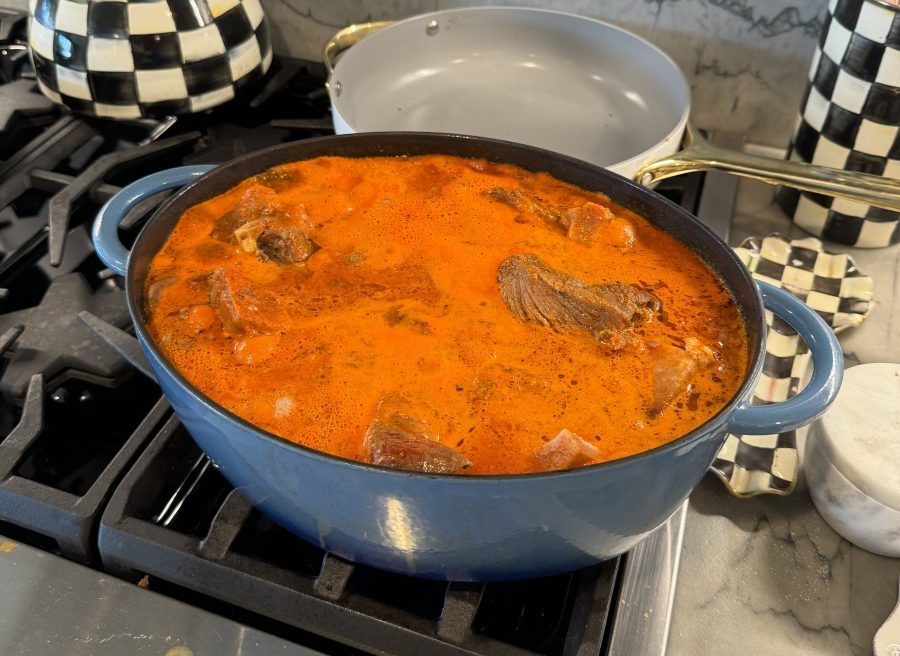 Pot of birria in homemade Chile sauce