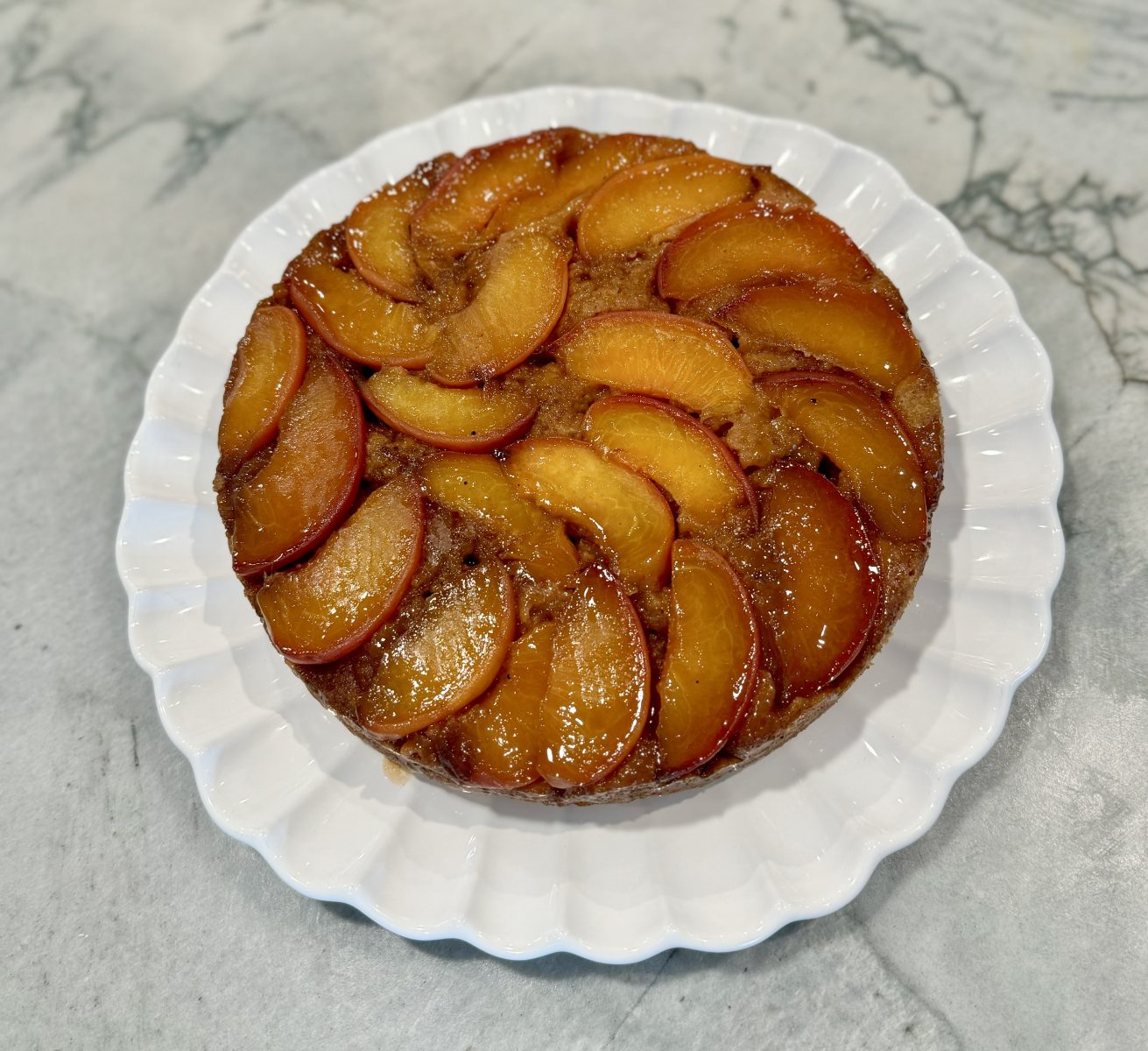 peach cake on white plate