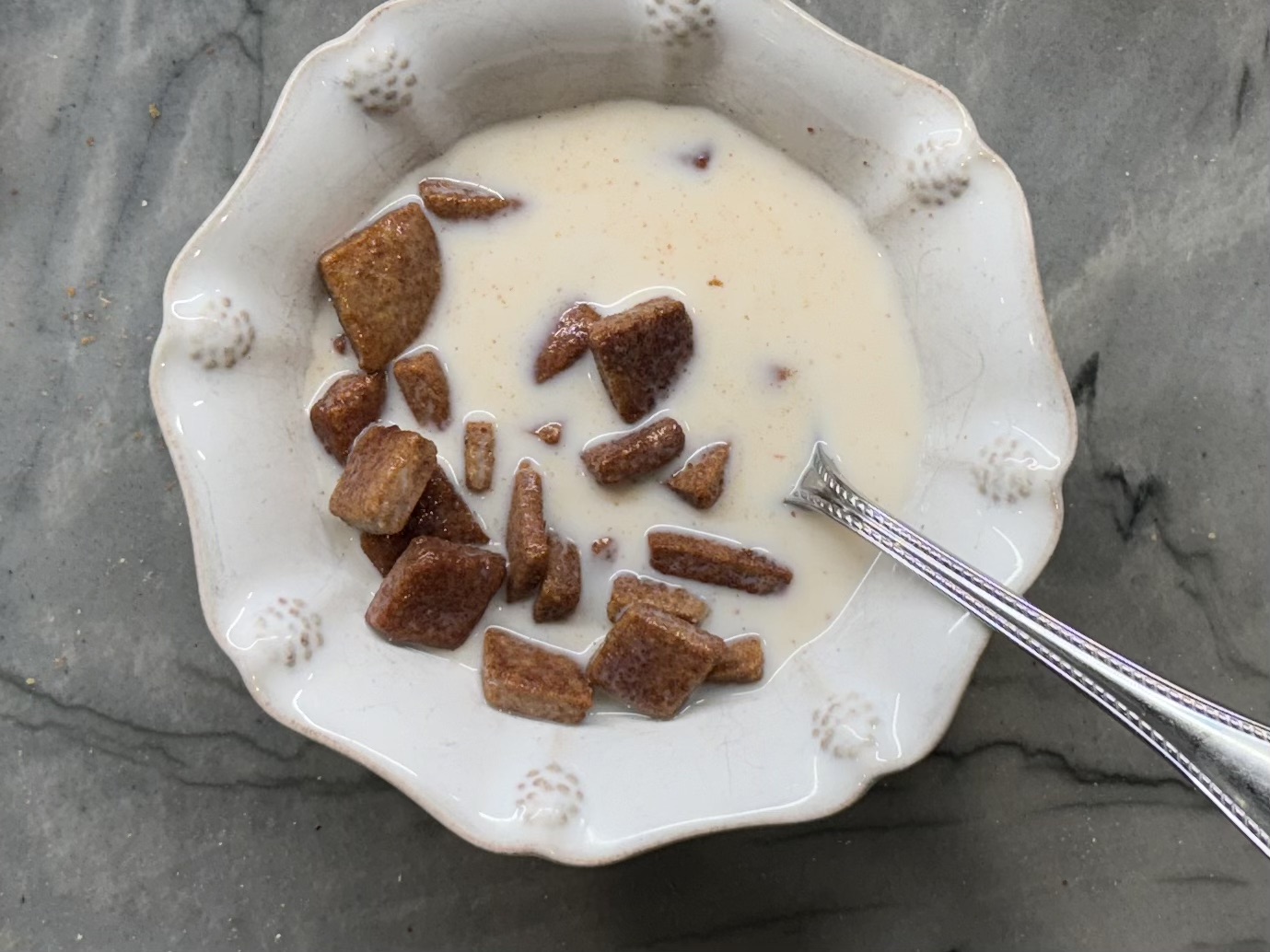 healthy cereal - Cinnamon Toast Crunch in bowl with milk