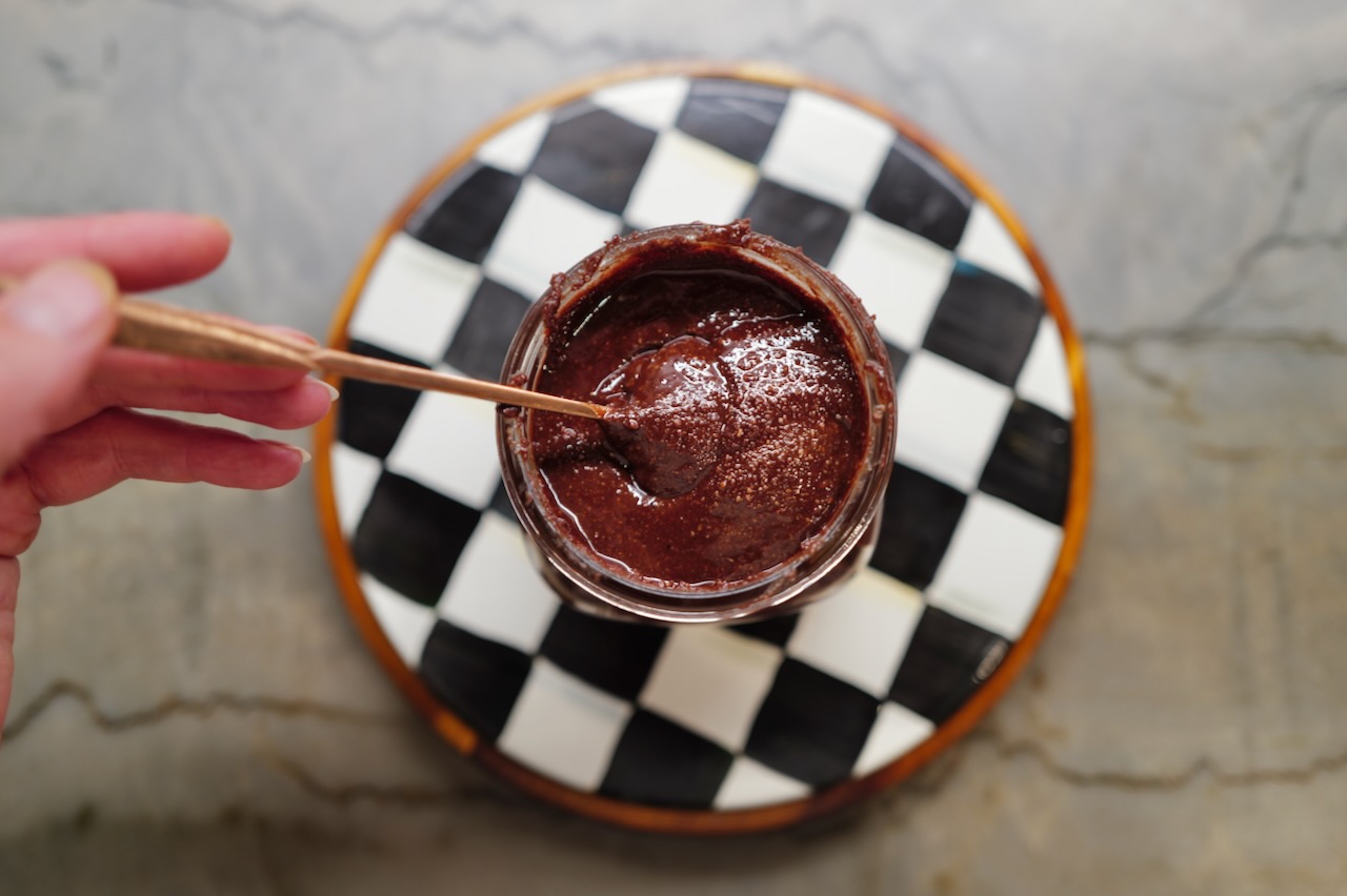 nutella in jar on checkered backdrop