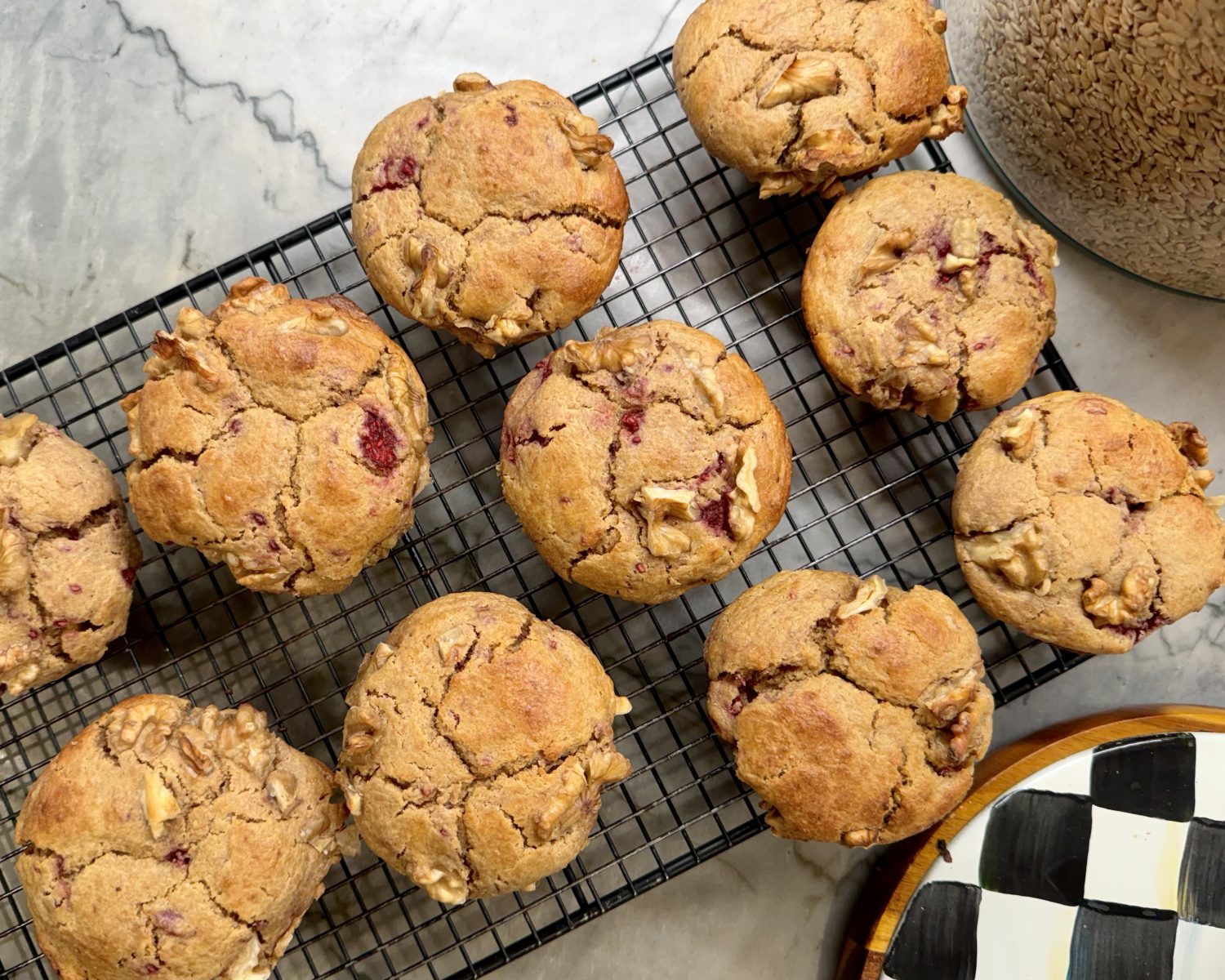 sourdough discard recipes - raspberry muffins on rack