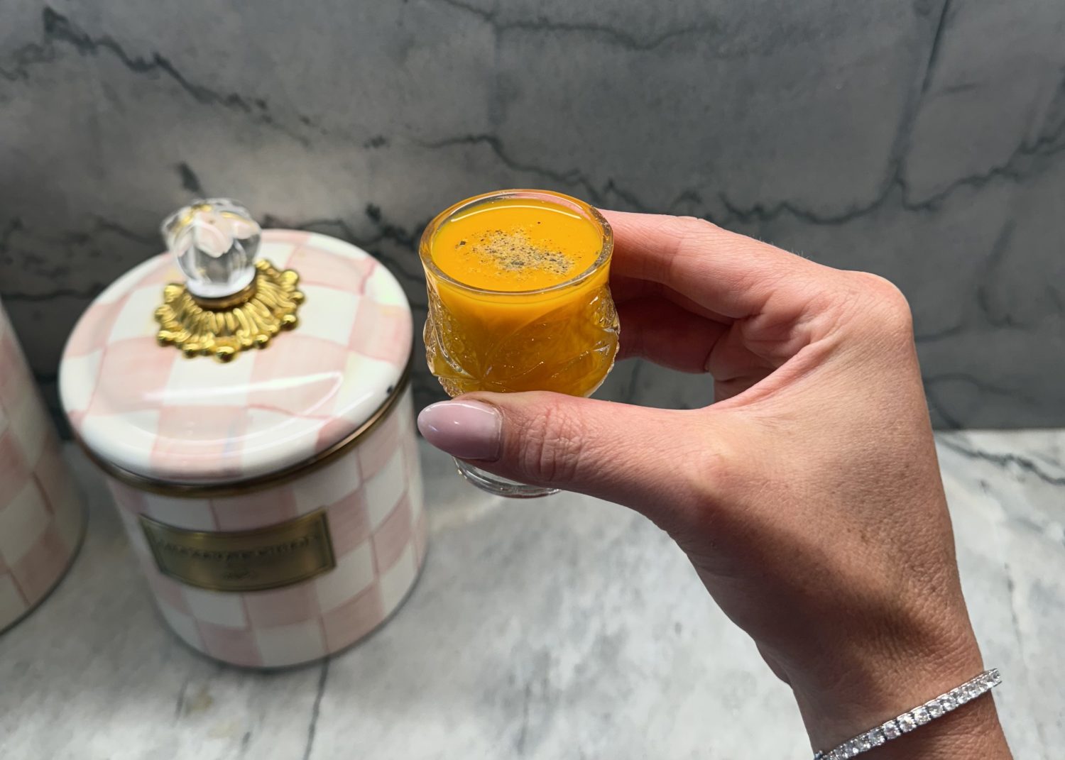 turmeric shot in a little glass shot glass