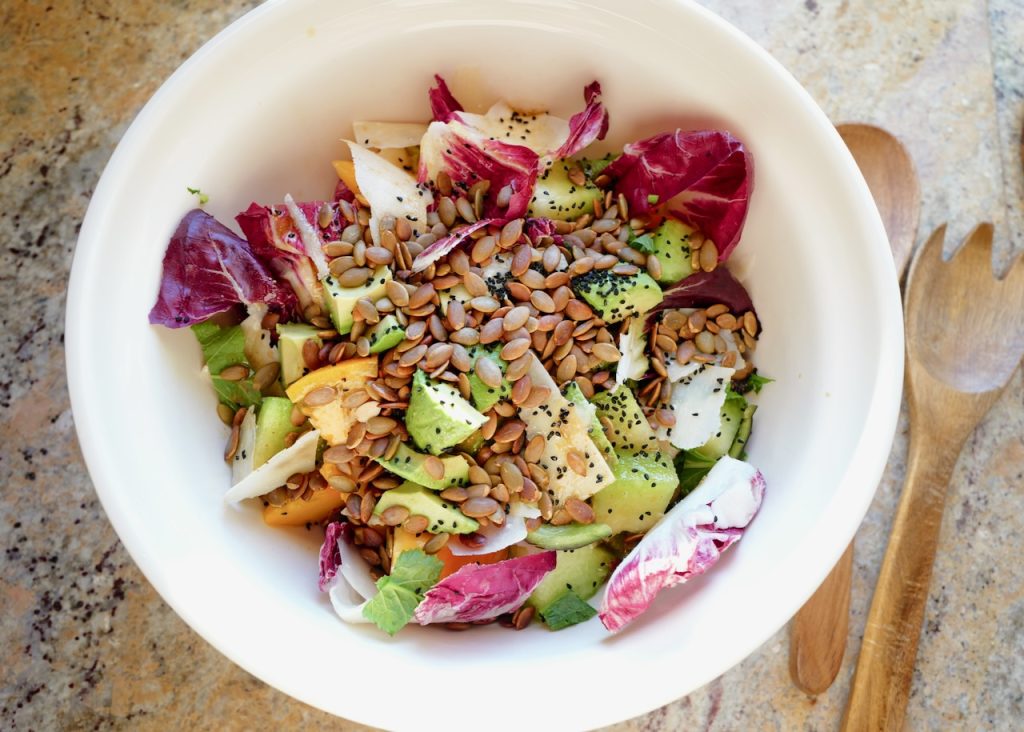 SUMMER TOMATO CANTALOUPE SALAD WITH PEPITAS IN SALAD BOWL